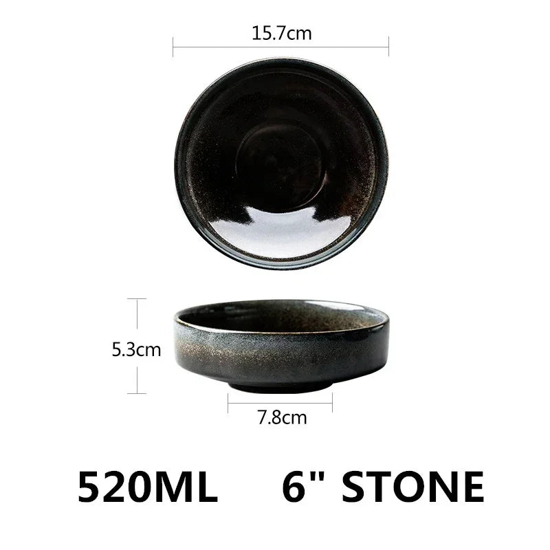 Black ceramic bowl with measurements on a white background