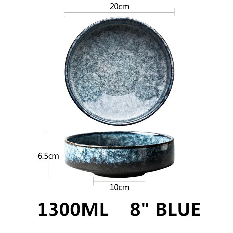 Blue ceramic bowls with measurements on a white background