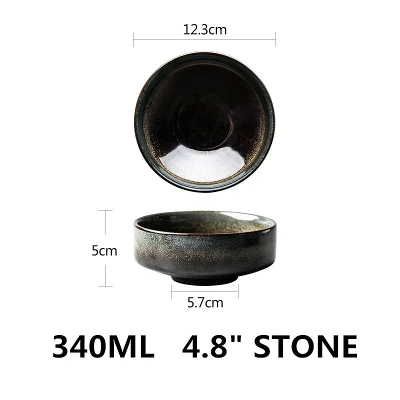 Black ceramic bowl with measurements on a white background