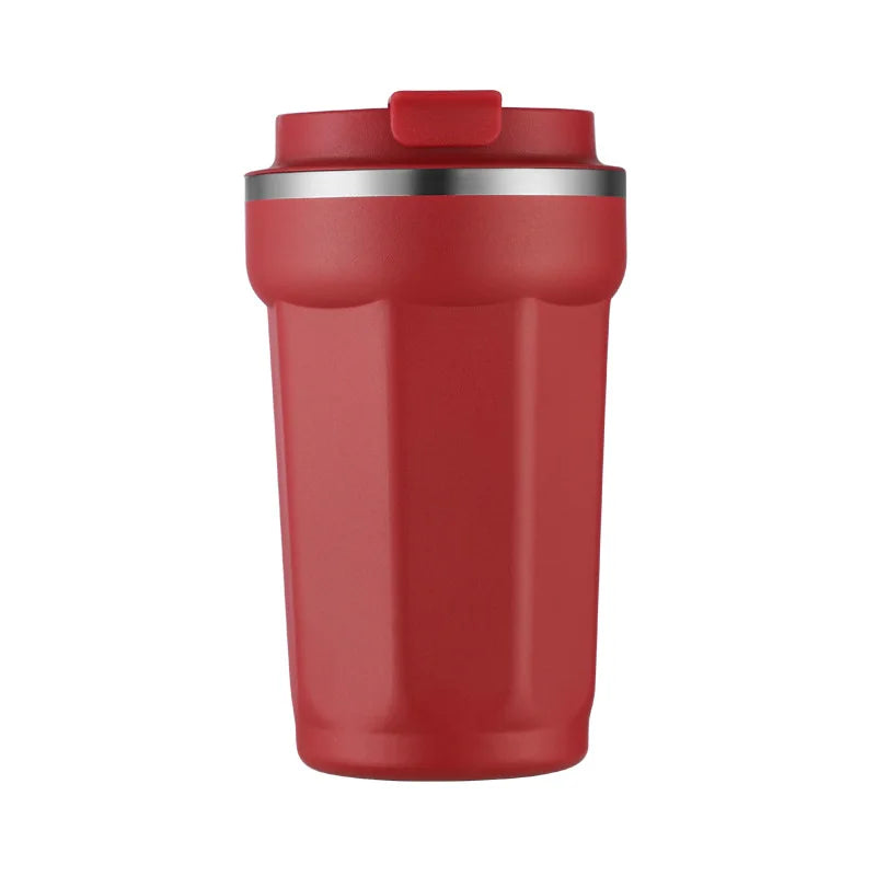 Red travel mug with a silver rim on a white background