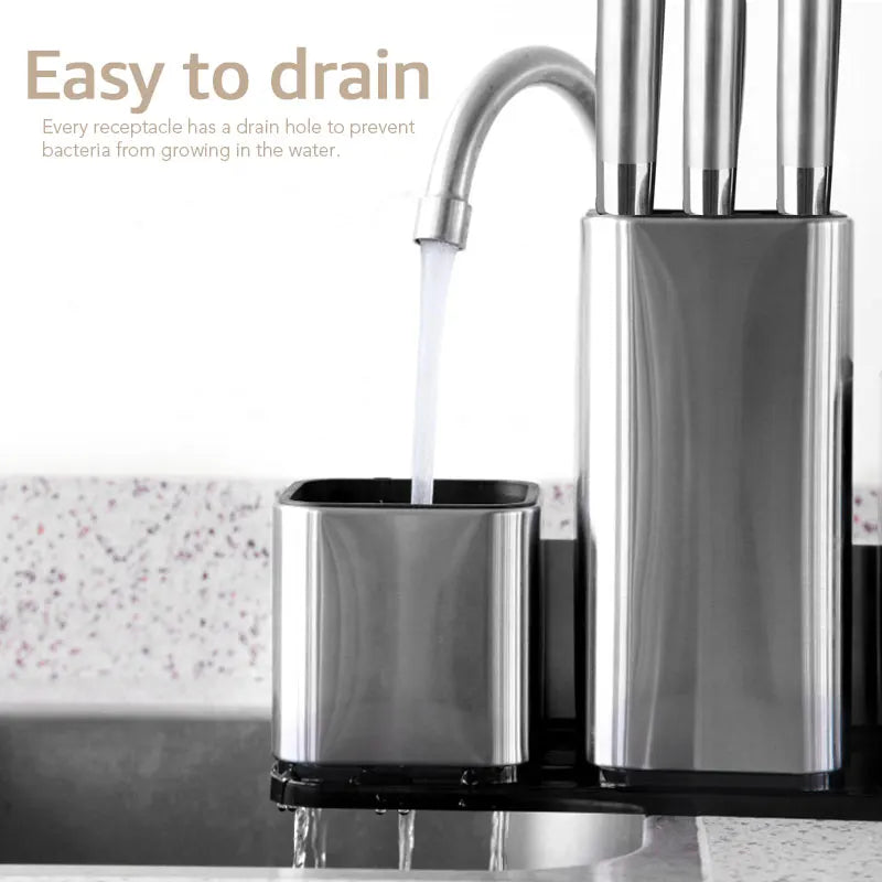 Chrome water filter with water flowing into a container, set against a kitchen sink background.
