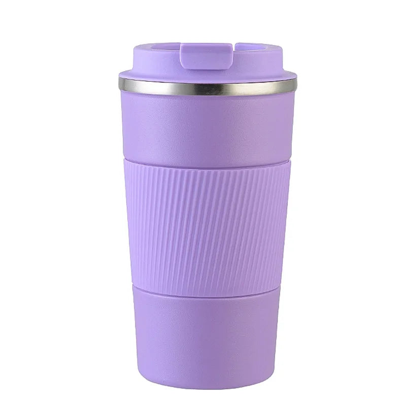 Purple travel mug with a silver rim on a white background