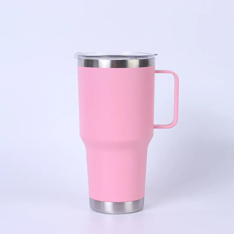 Pink travel mug with a handle on a white background