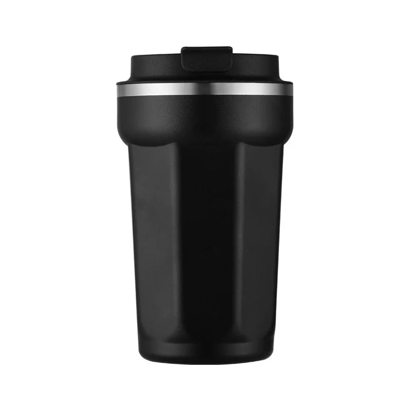 Green insulated travel mug with a silver rim on a white background