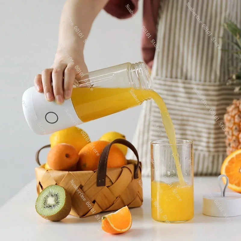 Person pouring orange juice from a pitcher into a glass, with a basket of fruits on a table.